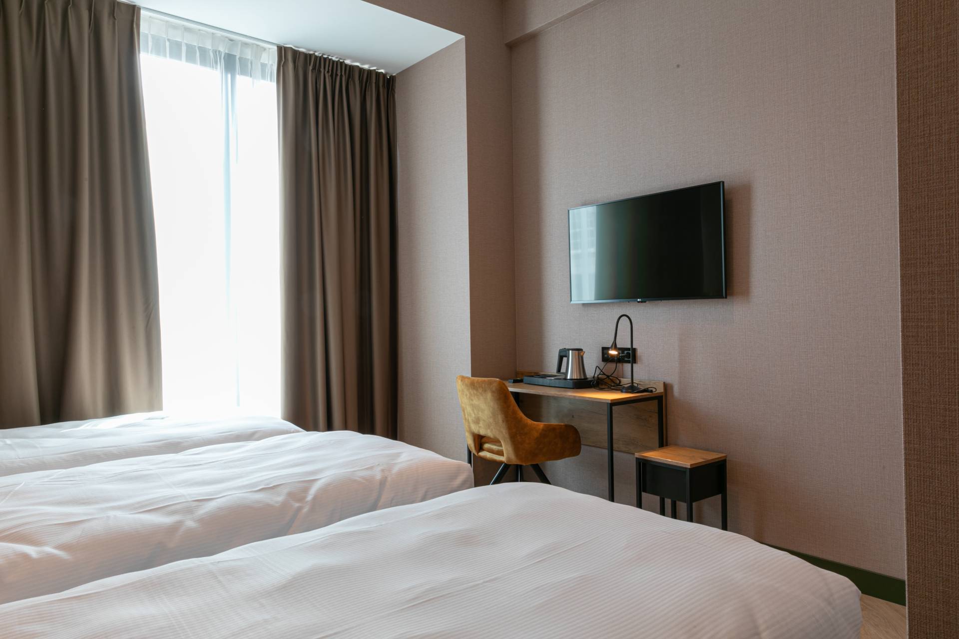 Deluxe kamer met drie bedden - tv